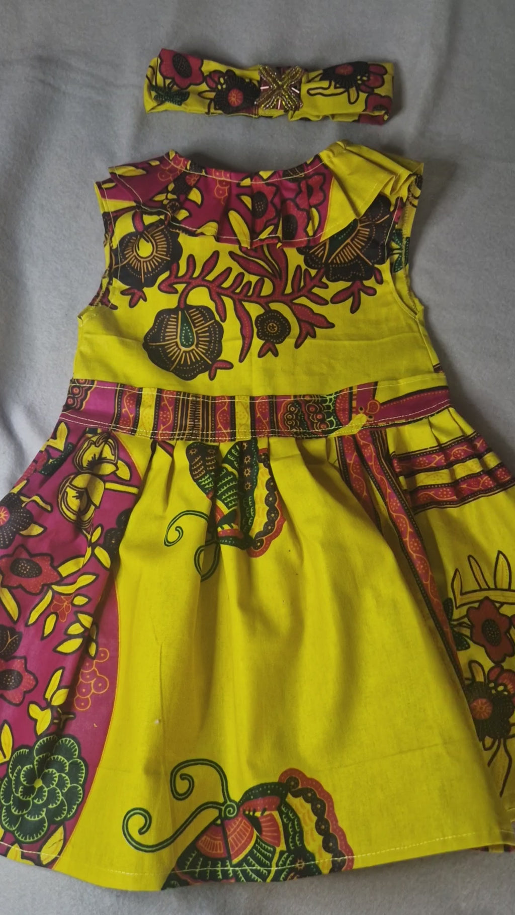 African waxprint baby dress and headband/ Size 12-18 months(499 kr)
