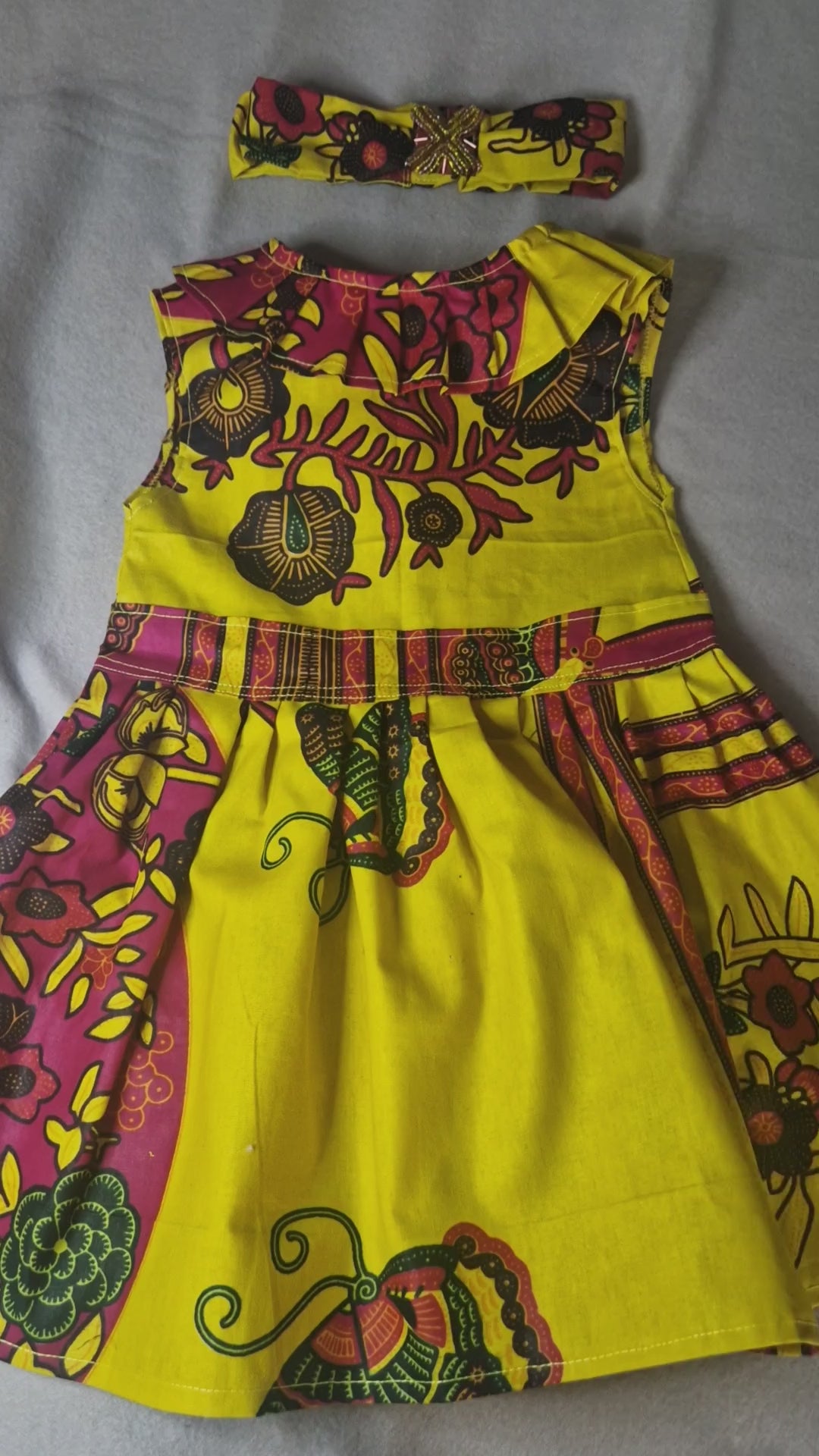 African waxprint baby dress and headband/ Size 12-18 months(499 kr)