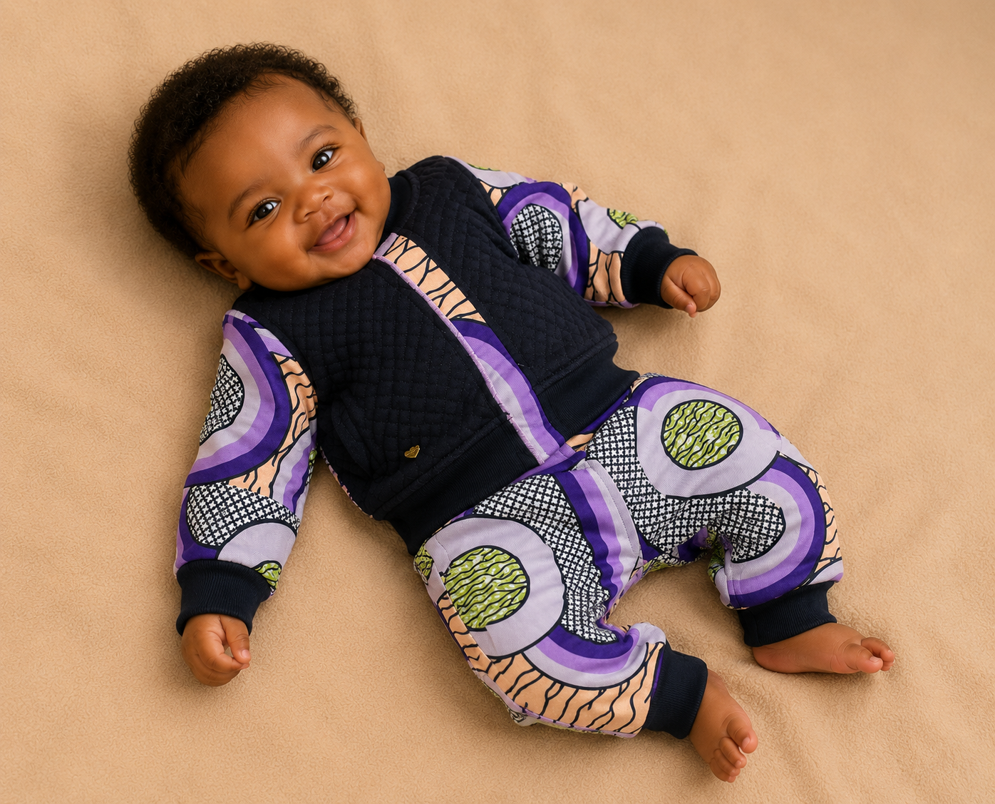 African waxprint Baby Set 0–3 Months – Quilted Jacket & Wax Print Pants( 499 kr)
