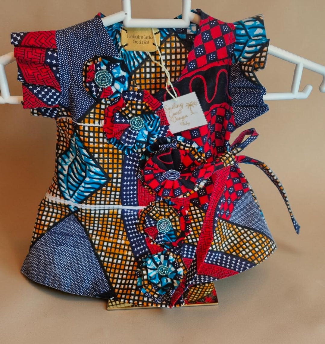African waxprint Baby Dress and headscarf (399 kr)