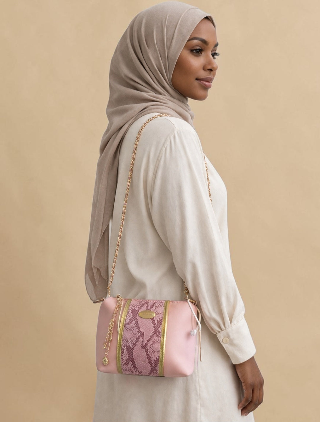 Pink snake crossbody bag (695 kr)