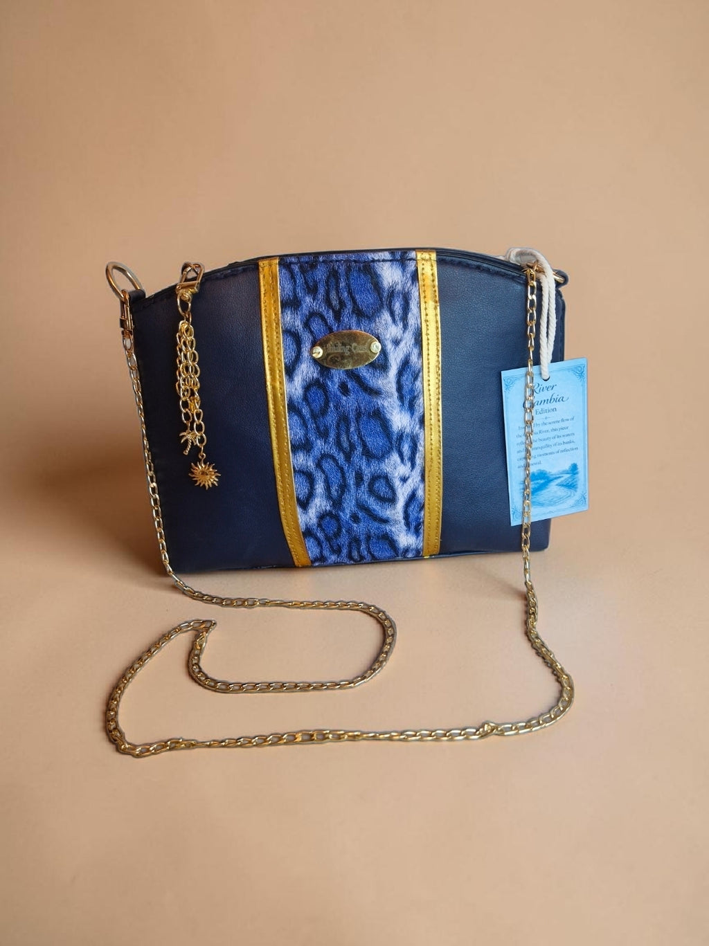 Animalprint-waxprint crossbody bag (595 kr)