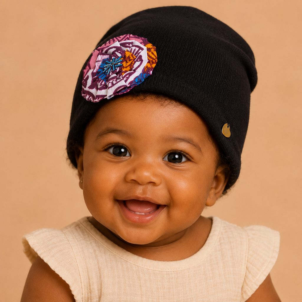 Baby Beanie with African waxprint Fabric Flower and hand-sewn beads/ Size 0-6 Months (199kr)