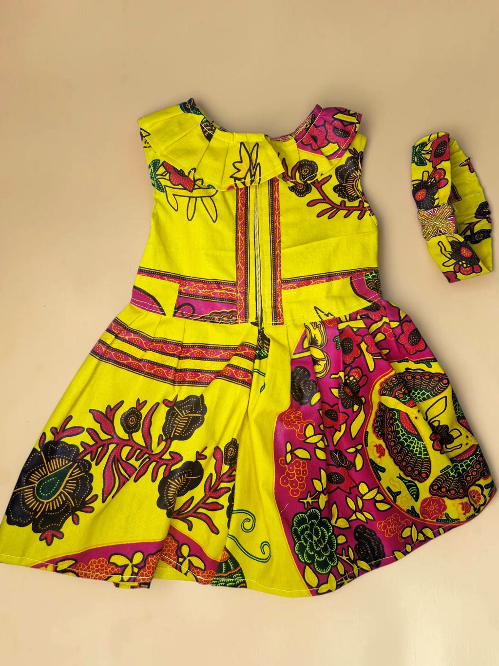 African waxprint baby dress and headband/ Size 12-18 months(499 kr)
