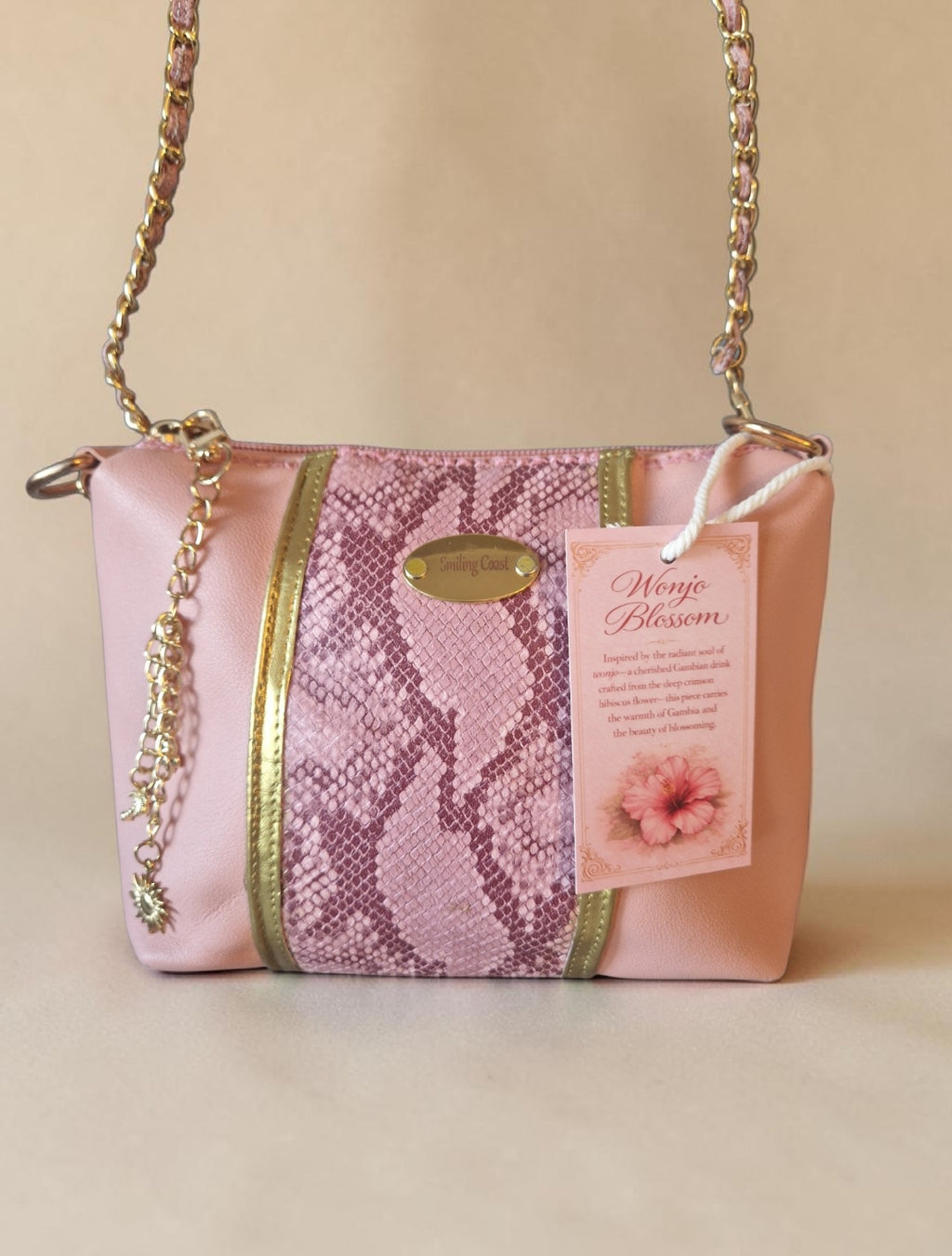 Pink snake crossbody bag (695 kr)