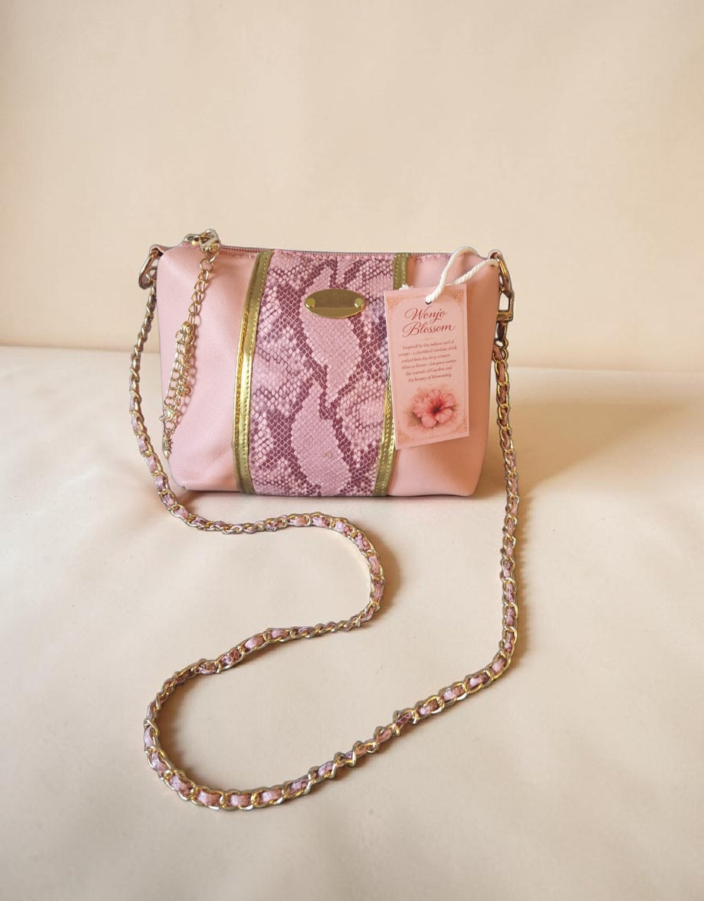 Pink snake crossbody bag (695 kr)