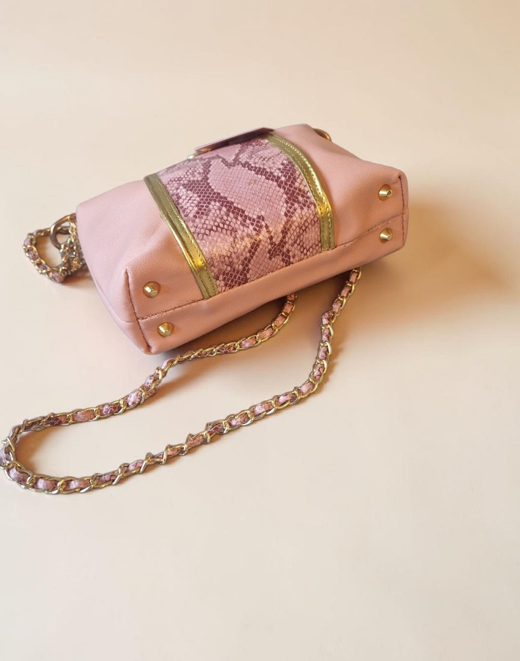 Pink snake crossbody bag (695 kr)