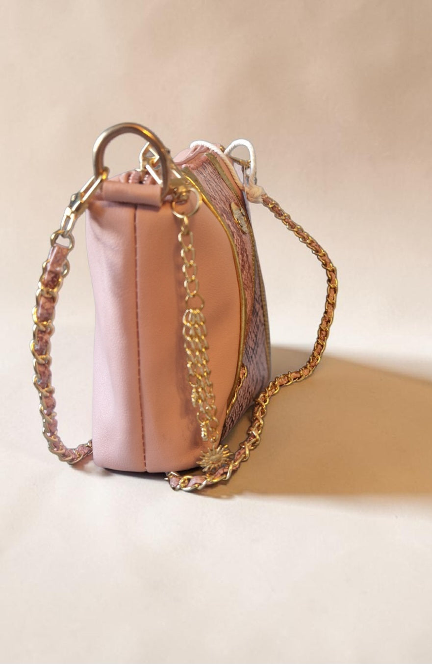 Pink snake crossbody bag (695 kr)
