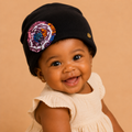 Baby Beanie with African waxprint Fabric Flower and hand-sewn beads/ Size 0-6 Months (199kr)