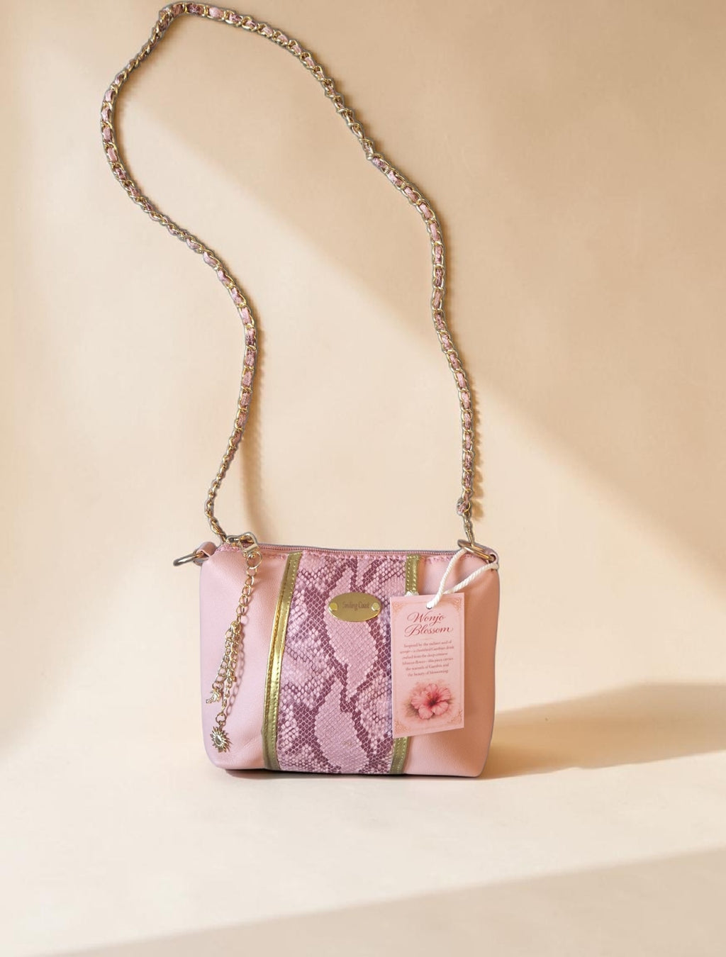 Pink snake crossbody bag (695 kr)
