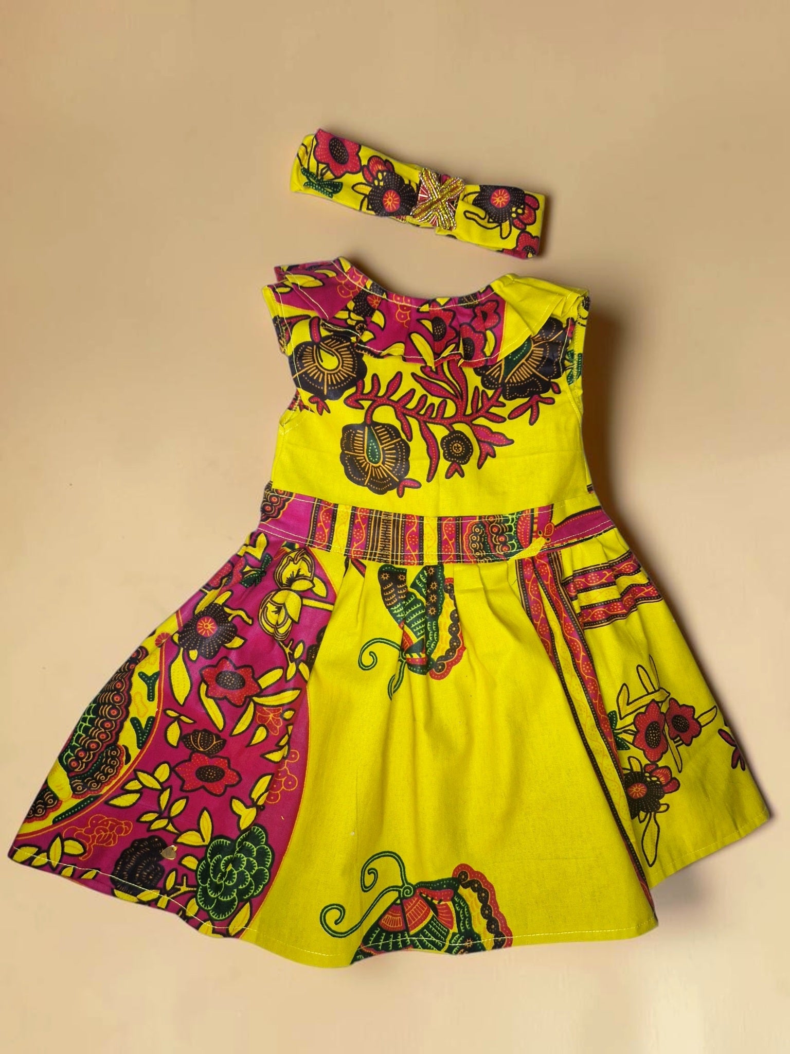African waxprint baby dress and headband/ Size 12-18 months(499 kr)