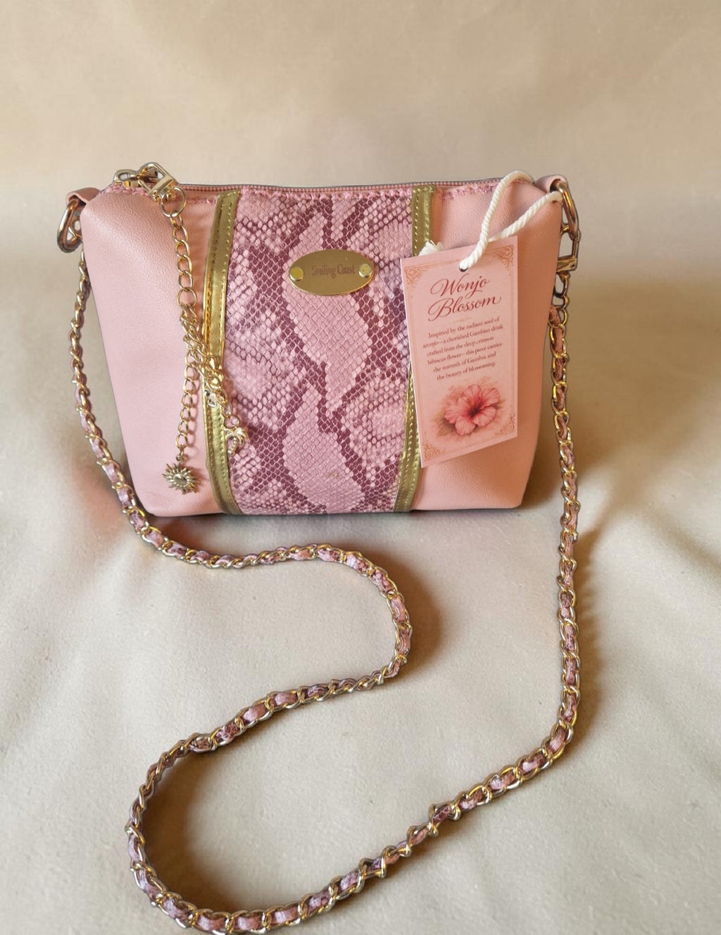 Pink snake crossbody bag (695 kr)